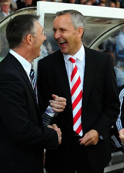 Keith Millen and Nigel Adkins Share a Laugh: Scunthorpe United vs. Bristol City, Championship Match, September 11, 2010