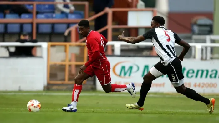 Framed Print : Kieran Agard Surges Past Bath City's Manny Monthe in Pre-Season Friendly