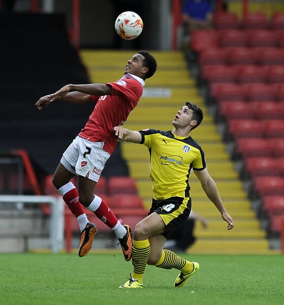 Korey Smith Takes Flight: Aerial Battle in Bristol City vs Colchester United