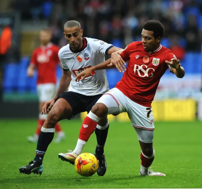 Framed Print : Korey Smith vs Darren Pratley: Intense Battle for Possession in Bolton Wanderers vs Bristol City Championship Clash Framed Print : Korey Smith vs Darren Pratley: Intense Battle for Possession in Bolton Wanderers vs Bristol City Championship Clash