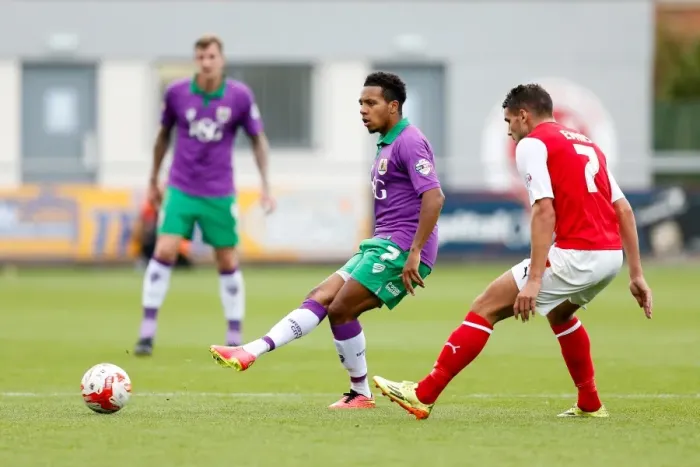Framed Print : Korey Smith vs Gareth Evans: Intense Moment in Fleetwood Town vs Bristol City Football Match, 2014