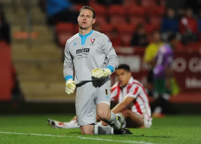 Framed Print : Korey Smith's Goal Mood Swings: Trevor Carson of Cheltenham Town Reacts in Disappointment as Bristol City Celebrates Framed Print : Korey Smith's Goal Mood Swings: Trevor Carson of Cheltenham Town Reacts in Disappointment as Bristol City Celebrates