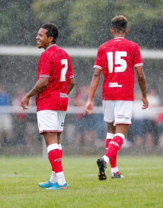 Framed Print : Korey Smith's Smiling Moment: Goal Scorer Celebrates in Preseason Community Match for Bristol City