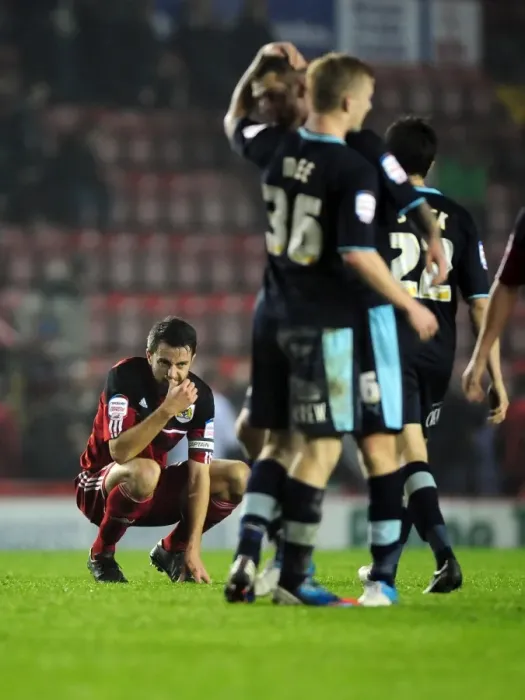 Framed Print : Last-Minute Heartbreak: Devastated Cole Skuse and Bristol City