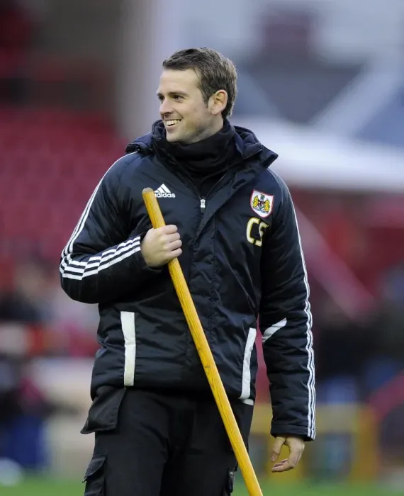 Framed Print : Laughing Groomsman Evades Stray Football Ball at Bristol City vs Rotherham United