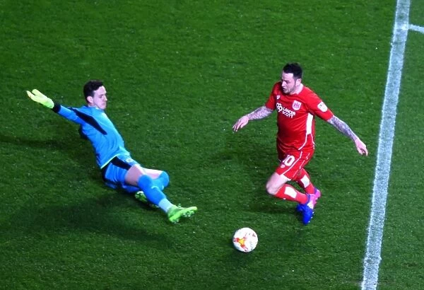 Lee Tomlin Scores Past Danny Ward: A Pivotal Moment in Bristol City's Sky Bet Championship Victory over Huddersfield Town (March 17, 2017)
