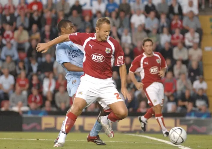 Framed Print : Lee Trundle's Past Glory: A Riveting Battle - Bristol City vs Manchester City