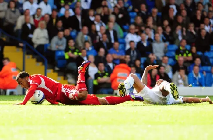 Framed Print : Leeds Kisnorbo Fouls Maynard, Red Carded in Penalty-Granting Clash at Elland Road (Leeds United v Bristol City, League Cup, 16th September 2011)