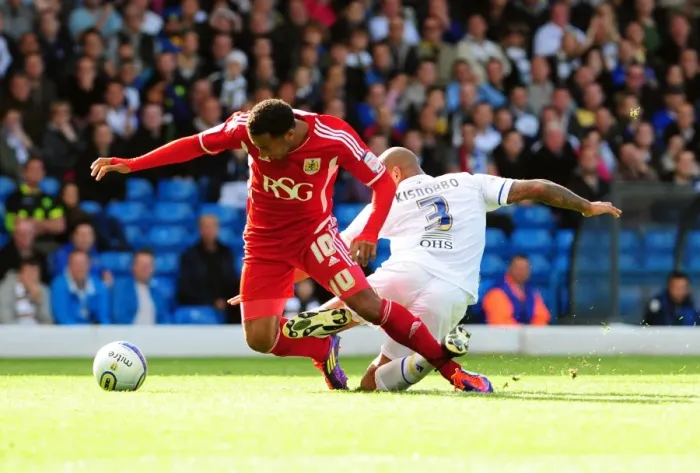 Framed Print : Leeds Kisnorbo Fouls Maynard, Gets Red Card in Leeds United vs. Bristol City League Cup Match - 16 / 09 / 2011