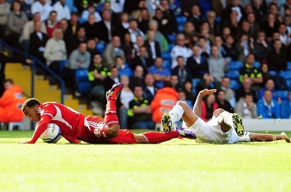 Leeds Kisnorbo Fouls Maynard, Red Carded in Penalty-Granting Clash at Elland Road (Leeds United v Bristol City, League Cup, 16th September 2011)