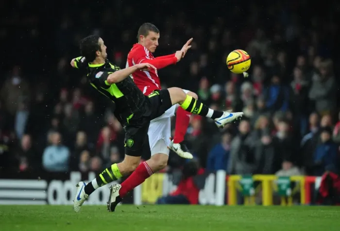 Framed Print : Leeds United's Danny Pugh Beats Bristol City's Chris Wood to the Ball in Championship Clash at Ashton Gate Stadium (Bristol City v Leeds United) Framed Print : Leeds United's Danny Pugh Beats Bristol City's Chris Wood to the Ball in Championship Clash at Ashton Gate Stadium (Bristol City v Leeds United)