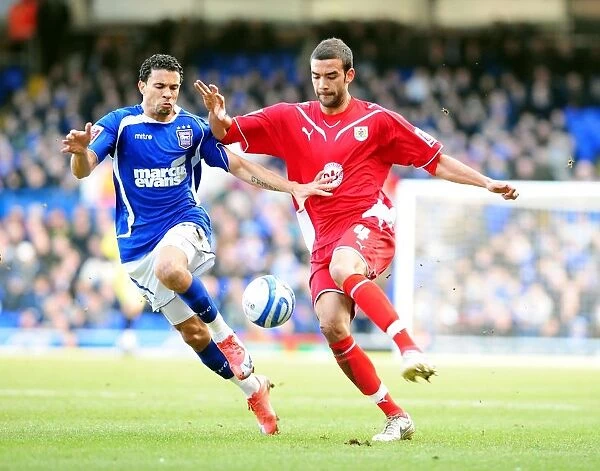 Liam Fontaine tussles with Carlos Edwards