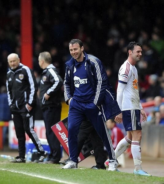 Light-Hearted Moment: Dougie Freedman and Chris Eagles Share a Joke Amidst the Tension of Bristol City vs. Bolton Wanderers (Npower Championship)