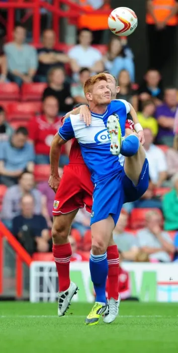 Framed Print : Louis Carey vs Matt Harold: A Battle for Supremacy in the Carey Testimonial Friendly, Bristol City vs Bristol Rovers, August 2012