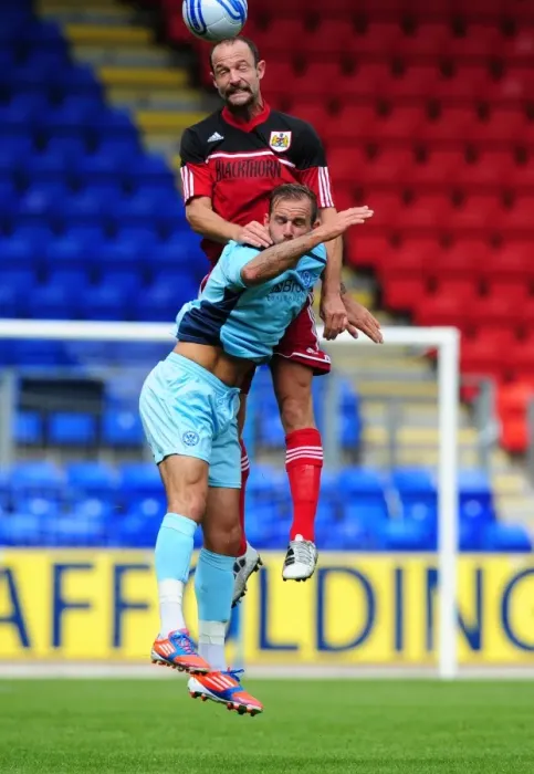 Framed Print : Louis Carey Wins the High Ball: Bristol City's Pre-Season Victory over St Johnstone at McDiarmid Park, 2012 Framed Print : Louis Carey Wins the High Ball: Bristol City's Pre-Season Victory over St Johnstone at McDiarmid Park, 2012