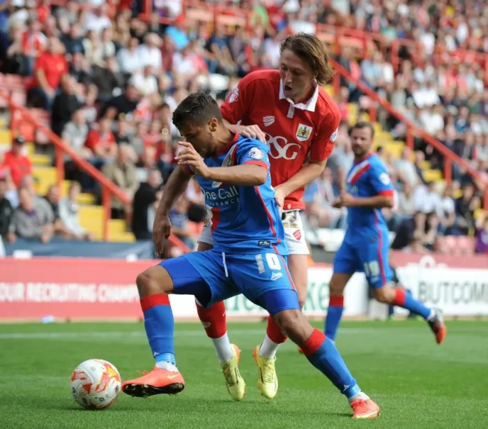 Framed Print : Luke Ayling's Intense Moment: Closing In on Doncaster Rovers Harry Forrester