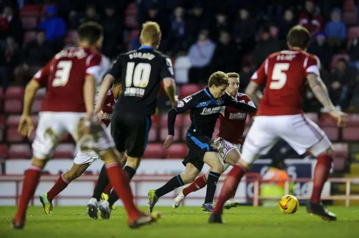Framed Print : Luke Freeman Breaks Through: Intense Moment from Bristol City vs. Stevenage (December 2013)