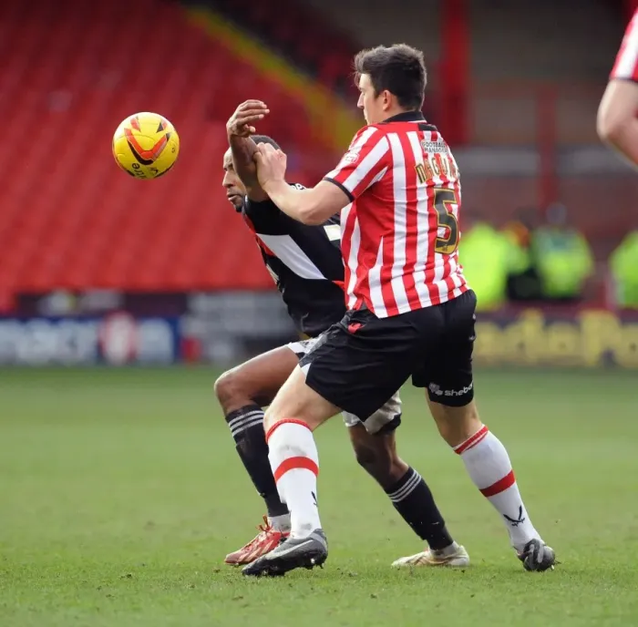 Framed Print : Maguire vs Barnett: Intense Battle for the Ball in Sheffield United vs. Bristol City Football Match, 2014 Framed Print : Maguire vs Barnett: Intense Battle for the Ball in Sheffield United vs. Bristol City Football Match, 2014
