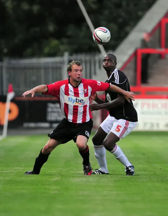 Framed Print : Marcus Stewart battles for the ball with Bristol Citys Kalifa Cisse