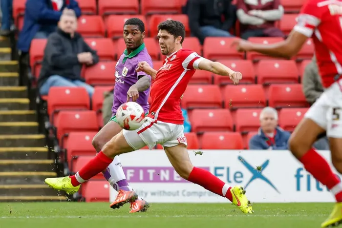 Framed Print : Mark Little of Bristol City Crosses Past Barnsley's Joe Dudgeon - Football Action, Barnsley v Bristol City Framed Print : Mark Little of Bristol City Crosses Past Barnsley's Joe Dudgeon - Football Action, Barnsley v Bristol City