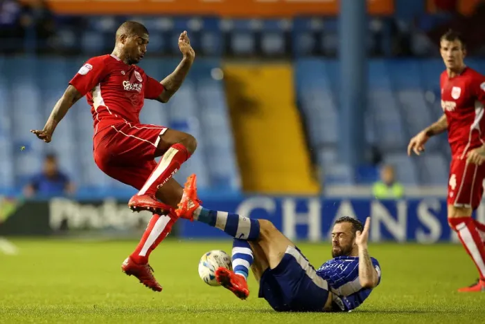 Framed Print : Mark Little Tackles Steven Fletcher: Intense Moment from Sheffield Wednesday vs. Bristol City Championship Clash Framed Print : Mark Little Tackles Steven Fletcher: Intense Moment from Sheffield Wednesday vs. Bristol City Championship Clash
