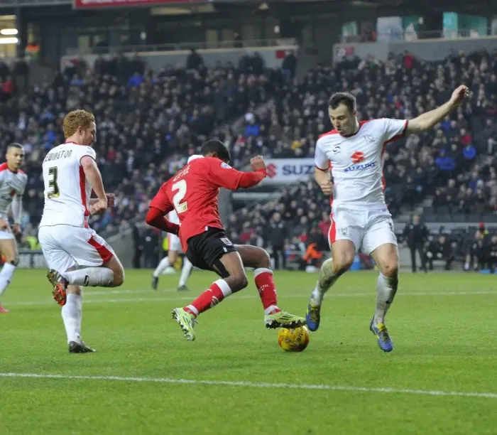 Framed Print : Mark Little vs Antony Kay: Intense Battle in MK Dons vs Bristol City Football Match, February 2015