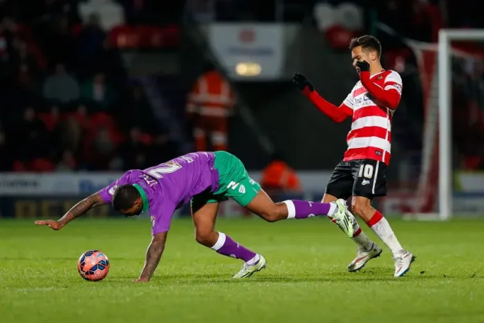 Framed Print : Mark Little vs Harry Forrester: Intense Battle at Doncaster Rovers vs Bristol City FA Cup Match, January 2015