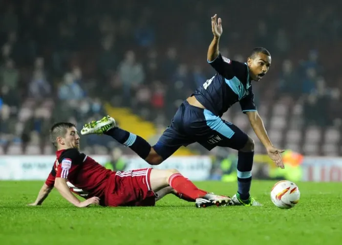 Framed Print : Mark Wilson Tackles Junior Stanislas in Intense Championship Showdown at Ashton Gate Stadium Framed Print : Mark Wilson Tackles Junior Stanislas in Intense Championship Showdown at Ashton Gate Stadium