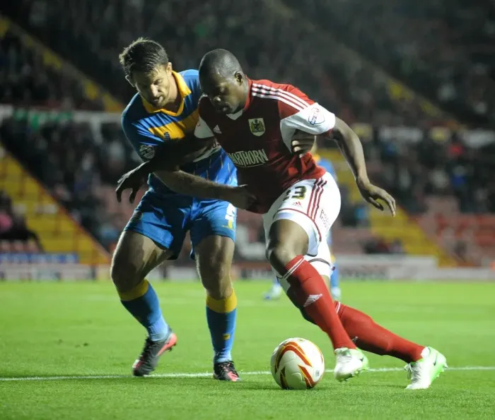 Framed Print : Marlon Harewood vs Darren Jones: Intense Battle at Ashton Gate - Bristol City vs Shrewsbury Town, Sky Bet League One Framed Print : Marlon Harewood vs Darren Jones: Intense Battle at Ashton Gate - Bristol City vs Shrewsbury Town, Sky Bet League One