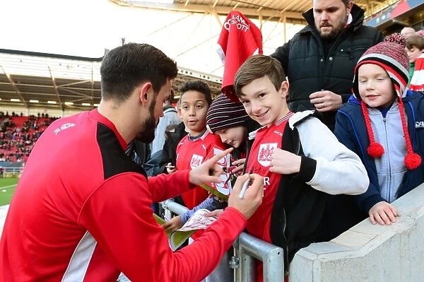 Marlon Pack of Bristol City Greets Fans with Signatures Amidst the Thrills of the Sky Bet Championship Match vs. Reading