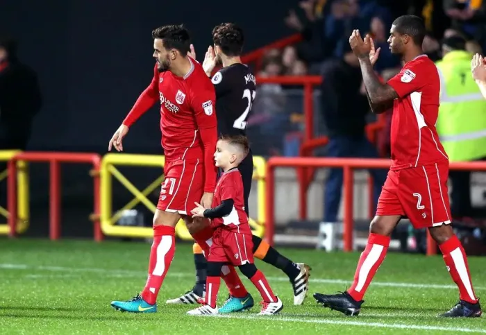 Framed Print : Marlon Pack and the Bristol City Mascot Lead Out the Team against Hull City in EFL Cup Match
