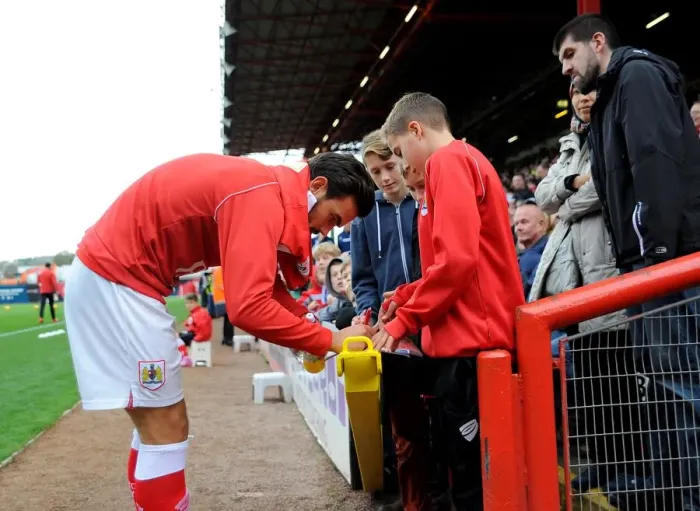 Framed Print : Marlon Pack of Bristol City Signing Autographs at Ashton Gate during Bristol City vs Oldham Football Match, November 2014