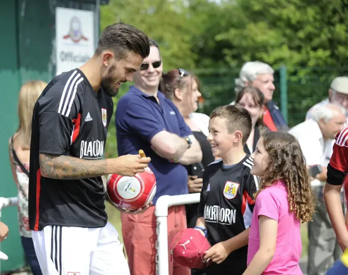 Framed Print : Marlon Pack of Bristol City Signs Autographs for Young Fans during Portishead Town Pre-Season Friendly Framed Print : Marlon Pack of Bristol City Signs Autographs for Young Fans during Portishead Town Pre-Season Friendly