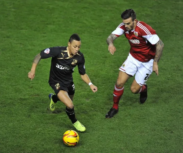 Framed Print : Marlon Pack Chases Kyle Bennett: Intense Football Action at Cardiff City Stadium