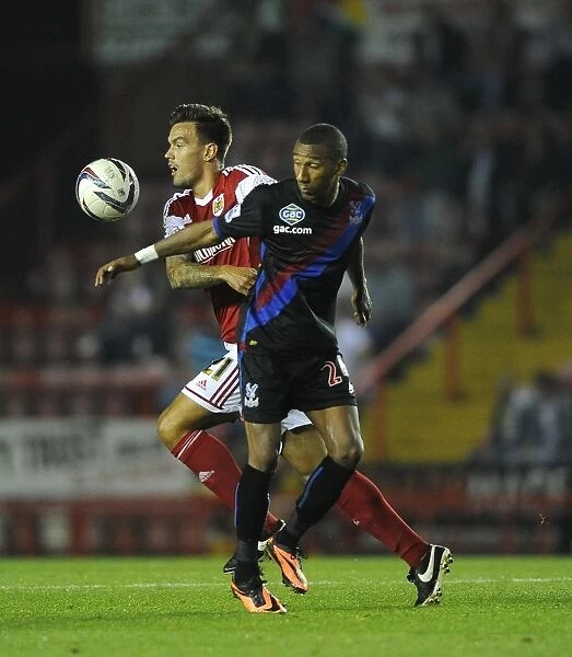 Marlon Pack Heads the Ball Over Grandin in Bristol City vs Crystal Palace Clash, 2013