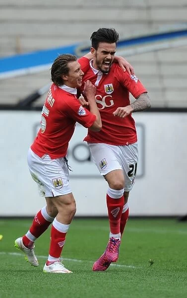 Marlon Pack and Luke Freeman: A Dynamic Duo Celebrates a Goal for Bristol City against Barnsley, 2015