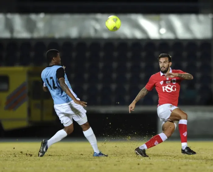 Framed Print : Marlon Pack Under Pressure: Passing the Ball for Bristol City against Botswana, 2014