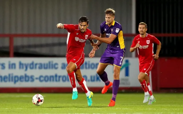 Framed Print : Marlon Pack Surges Past Harry Pell: Cheltenham Town vs. Bristol City Preseason Clash Framed Print : Marlon Pack Surges Past Harry Pell: Cheltenham Town vs. Bristol City Preseason Clash