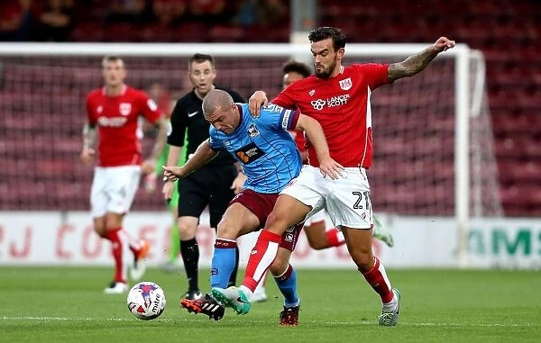 Marlon Pack Tackles Stephen Dawson: Intense Moment from Scunthorpe United vs. Bristol City EFL Cup Clash