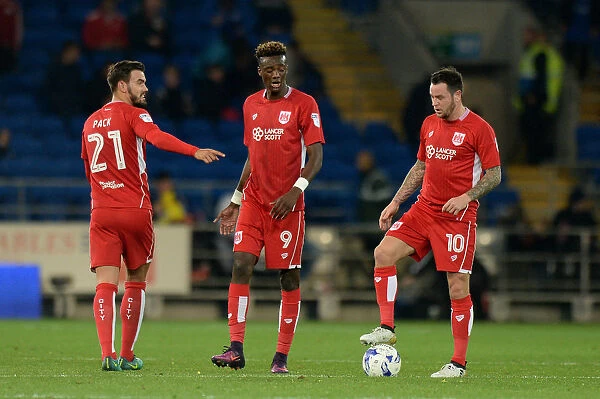 Marlon Pack, Tammy Abraham, and Lee Tomlin: Dejected After Conceding a Goal at Cardiff City Stadium