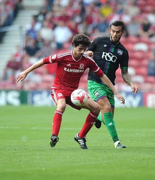 Marlon Pack vs Diego Fabbrini: Intense Battle for Ball Possession - Middlesbrough vs Bristol City, Sky Bet Championship