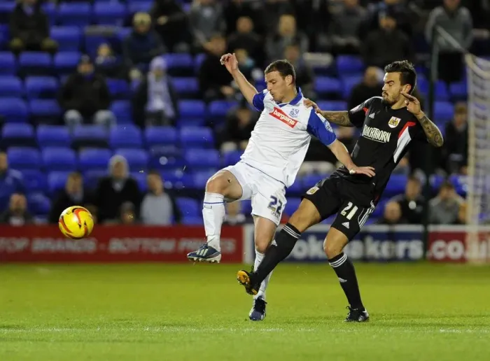 Framed Print : Marlon Pack vs Jason Koumas: Intense Battle at Prenton Park, Tranmere v Bristol City, Sky Bet League One