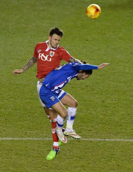Framed Print : Marlon Pack Wins High Ball Clash Against Bradley Dack in Bristol City's Johnstone's Paint Trophy Victory