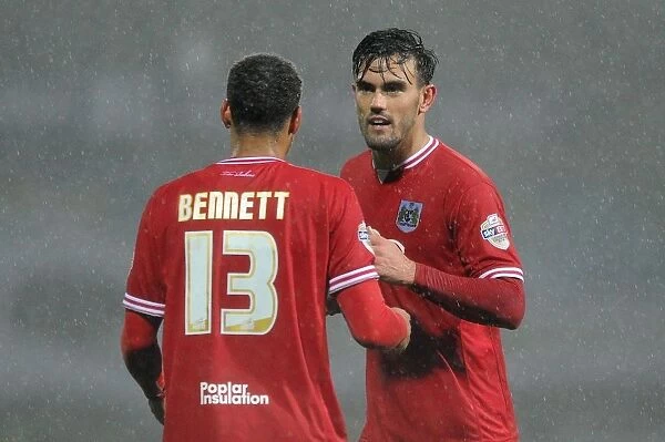 Maron Pack and Elliott Bennett of Bristol City: A Moment at Huddersfield's St. John Smith's Stadium