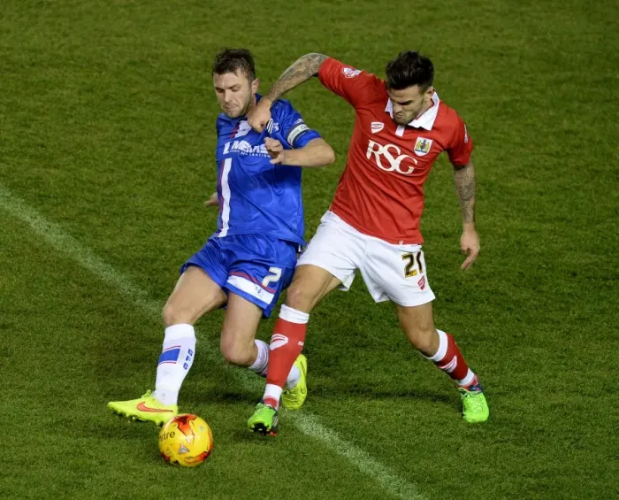 Framed Print : Maron Pack vs Doug Loft: Intense Battle for the Ball during Bristol City vs Gillingham, Johnstone's Paint Trophy Southern Area Final Framed Print : Maron Pack vs Doug Loft: Intense Battle for the Ball during Bristol City vs Gillingham, Johnstone's Paint Trophy Southern Area Final