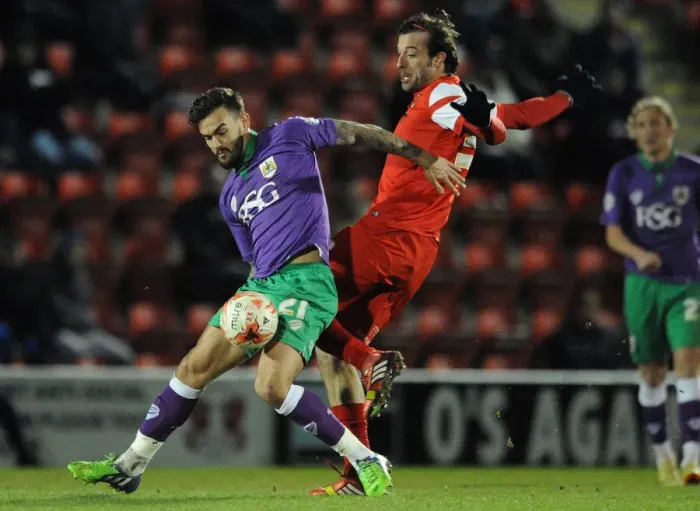 Framed Print : Maron Pack vs. Gianvito Plasmati: A Battle for Control in the Sky Bet League One Clash between Leyton Orient and Bristol City, March 2015