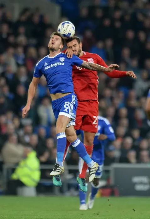 Framed Print : Maron Pack vs Joe Ralls: Intense Aerial Battle in Cardiff City vs Bristol City Championship Clash