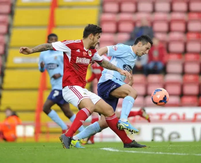 Framed Print : Maron Pack vs. Luke Howell: Intense Battle for Ball Possession in Bristol City vs. Dagenham and Redbridge FA Cup Match Framed Print : Maron Pack vs. Luke Howell: Intense Battle for Ball Possession in Bristol City vs. Dagenham and Redbridge FA Cup Match