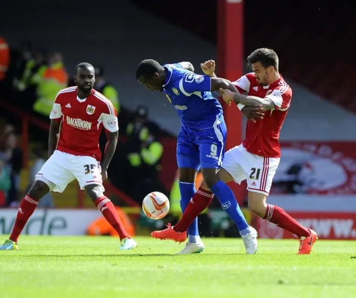 Framed Print : Maron Pack vs. Mathias Pogba: Intense Battle for the Ball in Bristol City vs. Crewe Football Match, 2014