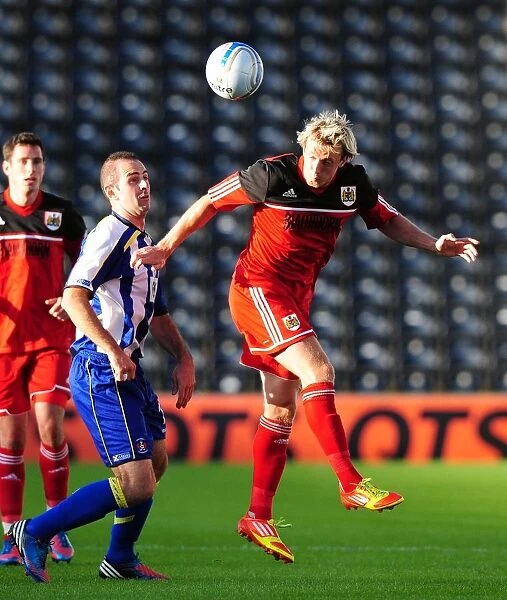 Martyn Woolford Claims High Ball Victory: Kilmarnock vs. Bristol City, Pre-Season Friendly, 2012